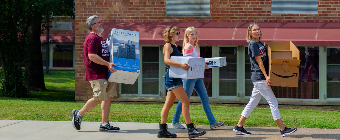 students-moving-boxes