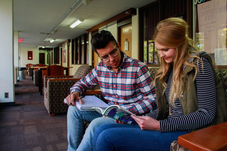 SIU housing shout out - students studying together.